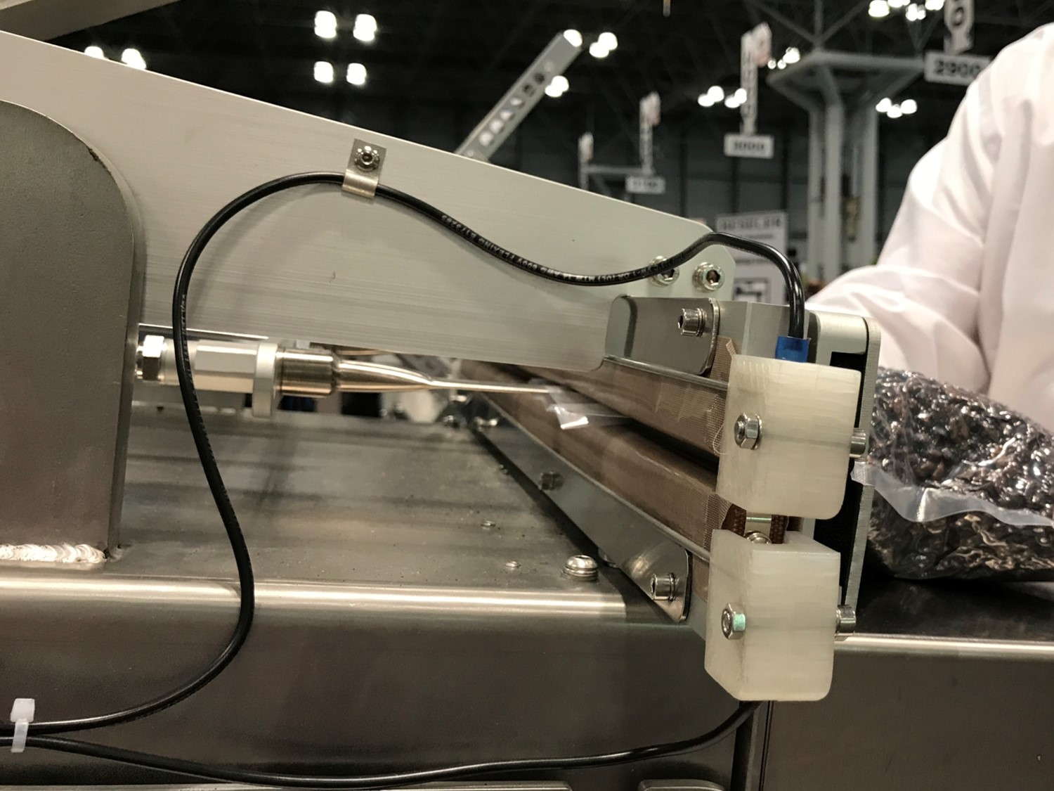 Industrial packaging line using PTFE coated release materials