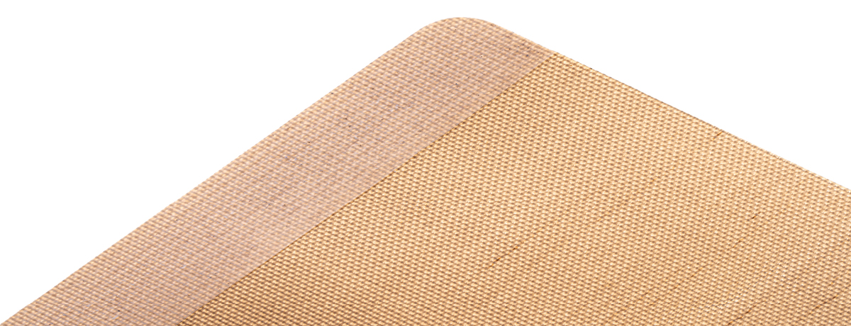 Heat sealed fabric edge reinforcement for conveyor belts