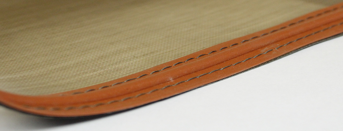 Silicone rubber guides for conveyor belt tracking